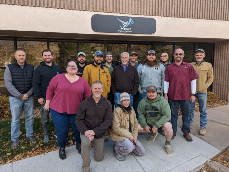 The Vivid Engineering Group Colorado Springs office staff standing outside of the office, posed for a group photo.